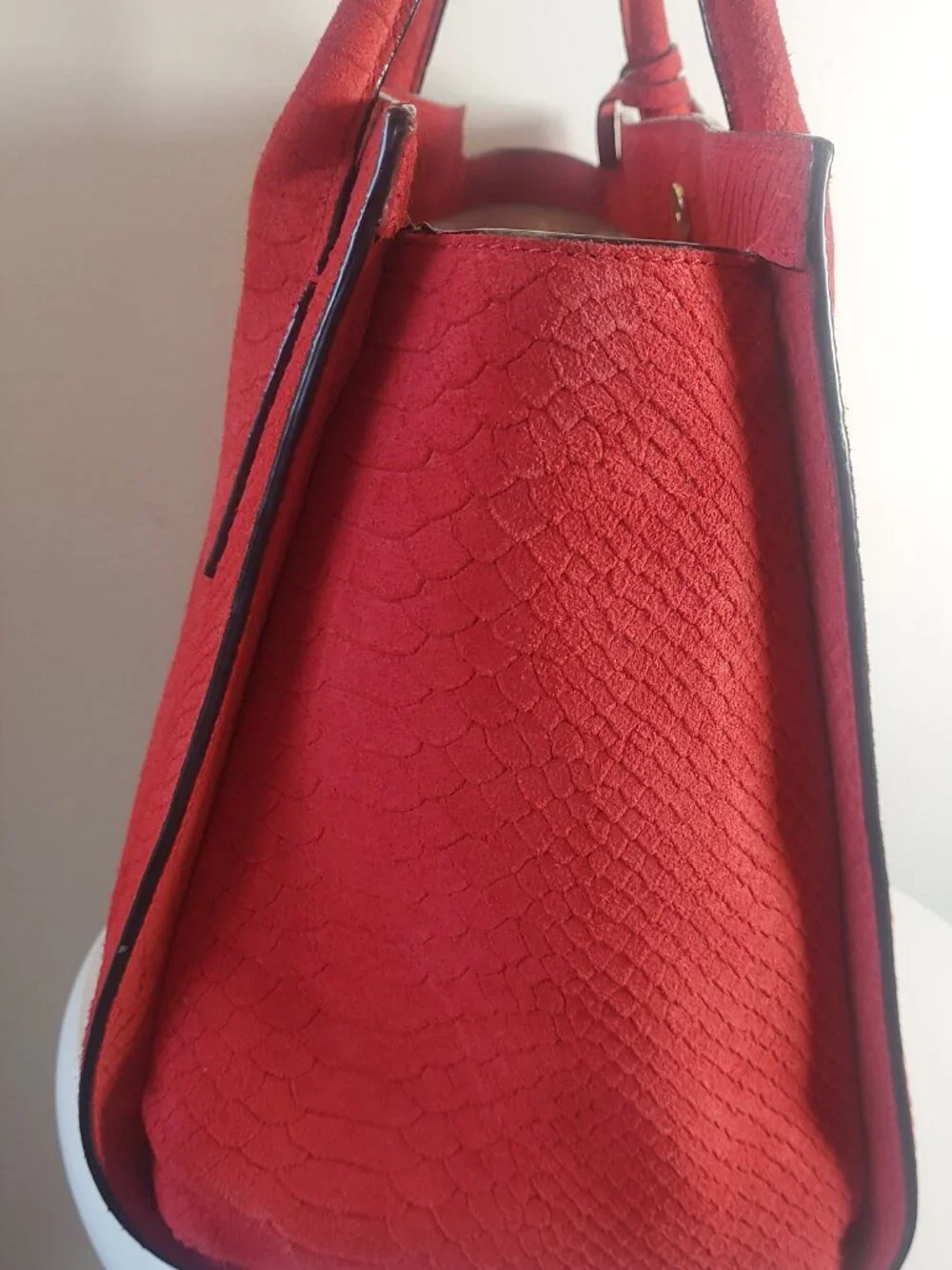 19. Kate Spade New York Red Embossed Suede Large Top Handle Bag